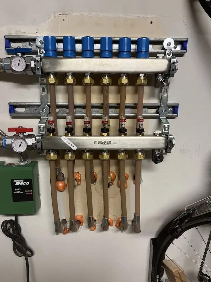 Plumber performing Water Heater Repair at a residential property in Everett